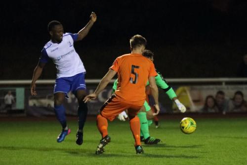 Leiston keeper Marcus Garnham gathers the rebound after blocking Ryan Blakes attempt to flick the ball past him