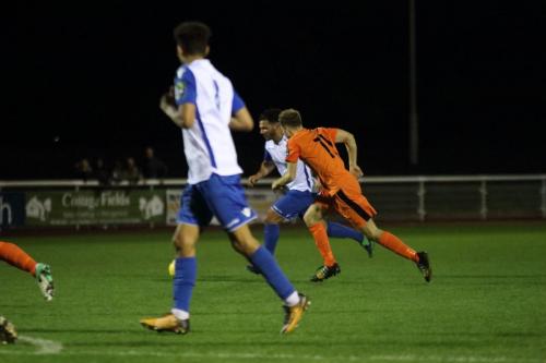 Mario Noto advances before firing the first Enfield goal from outside the penalty area