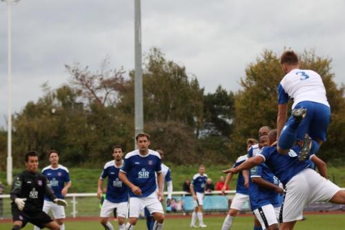 Enfields Dan Rumens (far R) heads narrowly wide