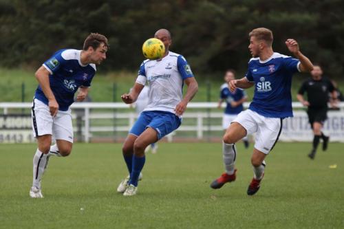 Margates Liam Friend (L) and Ben Swift and Enfields Simon Thomas