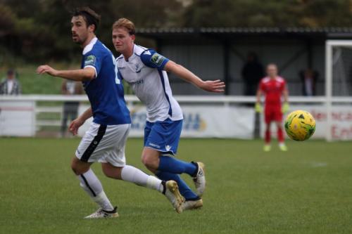 Margates Tom Mills (L) and Enfields Aaron Greene