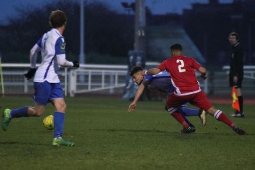 Enfields Aaron Greene (L) and Samir Bihmoutine and Mersthams Michael Abnett