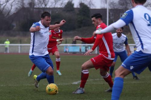 Enfields Adam Martin (L) and Mersthams Tom Kavanagh