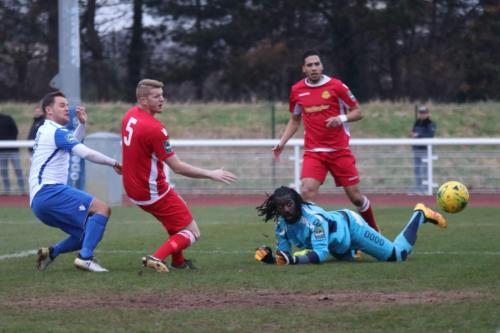 Enfields Liam Hope (L) opens the scoring