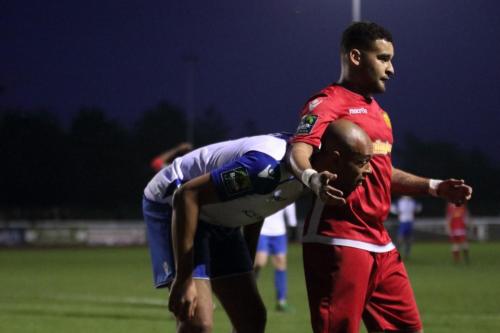 Enfields Simon Thomas (L) and Mersthams Michael Abnett