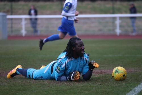Merstham keeper Ashlee Jones has just been beaten from the penalty spot but doesnt seem too bothered