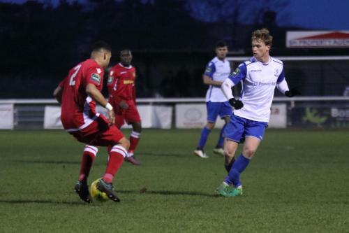 Mersthams Michael Abnett (L) cuts out Aaron Greenes pass