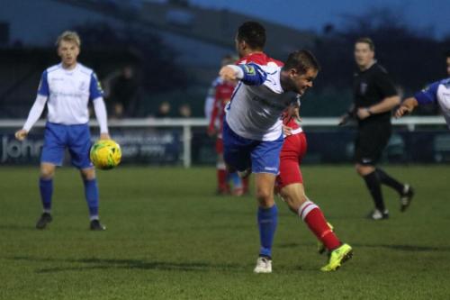 Mersthams Tutu Henriques (red) and Enfields Liam Hope