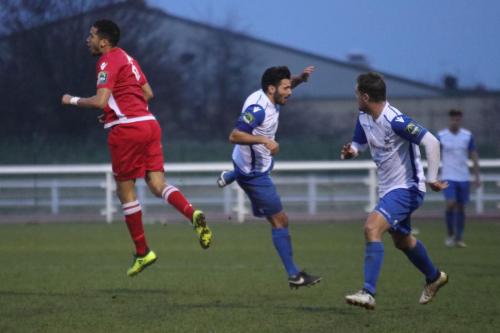 Mersthams Tutu Henriques and Enfields Mario Noto and Liam Hope (R)