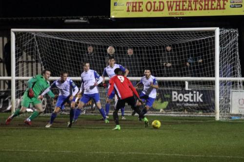 Burgess Hills Ibrahim Forfana (red) cant reach the loose ball  From the clearance Enfield scored their second goal