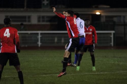 Burgess Hills Jack Brivio (red) challenges Mario Noto