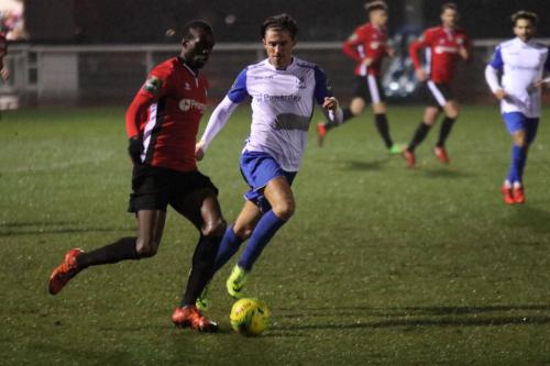 Burgess Hills Stephane Ngamvoulou (L) and Enfields Sam Youngs