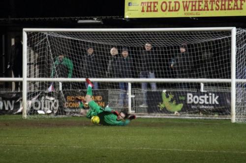 Enfields Joe Wright saves from a free kick