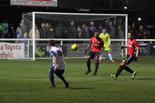 Enfields John Kyriacou (16) crosses