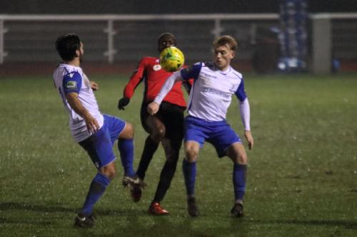 Enfields Mario Noto (L) and Ryan Blackman and Burgess Hills Stephane Ngamvoulou