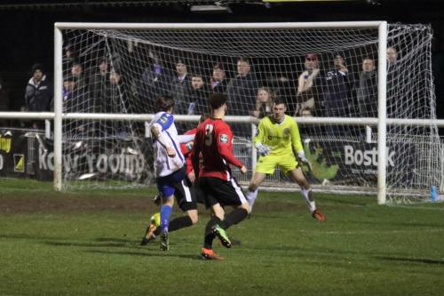 Enfields Mickey Parcell shoots across the face of goal