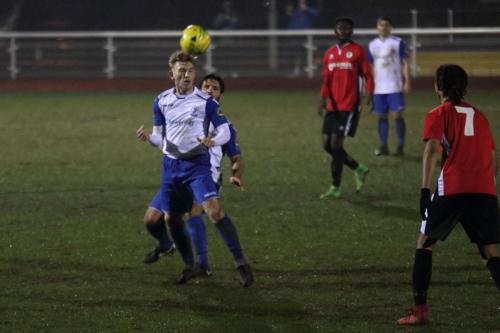 Enfields Ryan Blackman heads clear