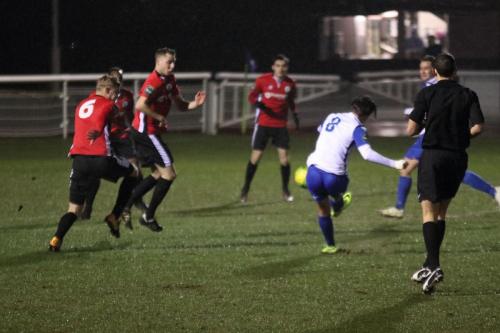 Enfields Sam Youngs shoots from the edge of the box