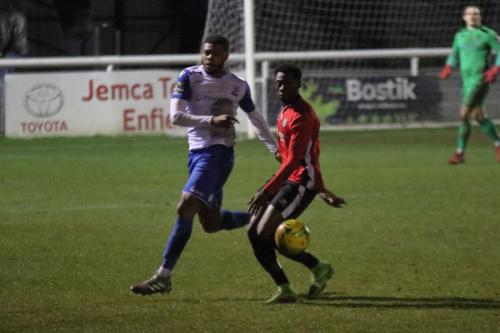 Enfields Taofiq Olomowewe (L) and Burgess Hills Ibrahim Forfana