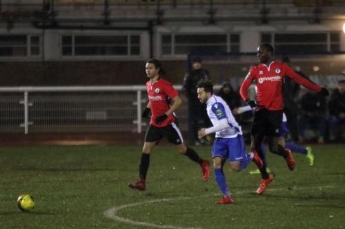 Enfields Tyler Campbell and Burgess Hills Che Krabbendam (L) and Stephane Ngamvoulou