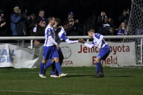 Ryan Blackman (R) congratulate scorer Ryan Blake on the third goal