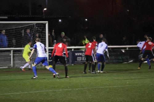 Taofiq Olomowewe (white no 4) heads Enfield into an early lead