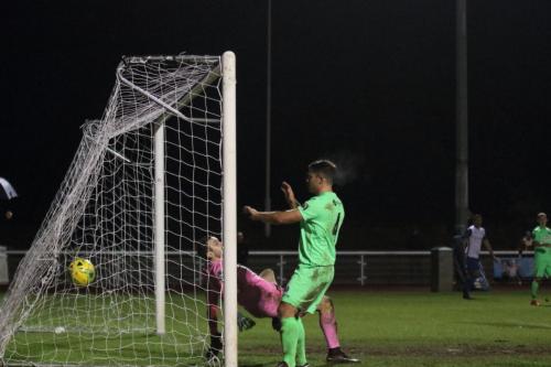 Dorking keeper Slavomir Huk is beaten by Ryan Blackmans cross shot for the winning goal75