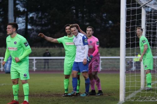 Dorkings Giuseppe Sole (2nd L) and Enfields Mickey Parcell share a joke