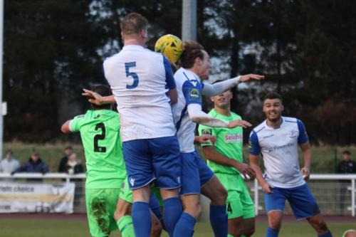 Enfields Mark Kirby (5) heads the ball against team mate Mickey Parcell