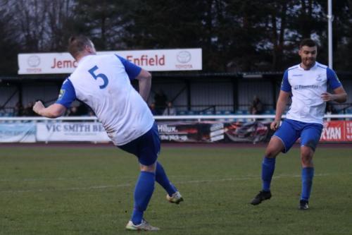 Enfields Mark Kirby (5) shoots watched by Taylor McKenzie