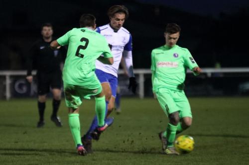Enfields Sam Youngs challenged by Dean Hamlin (2) and James McShane