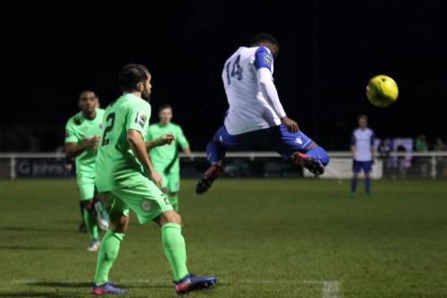 Ryan Blackman heads the ball to the wing