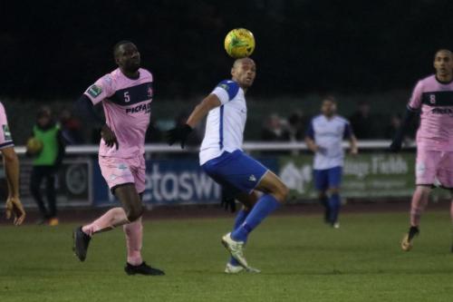 Dulwichs Anthony Acheampong (L) and Enfields Simon Thomas