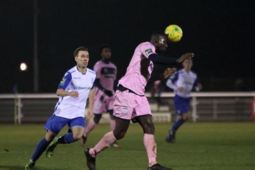 Dulwichs Anthony Acheampong (R) heads clear from Ben Ward-Cochrane