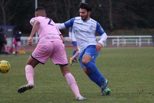 Dulwichs Quade Taylor (L) and Enfields Mario Noto