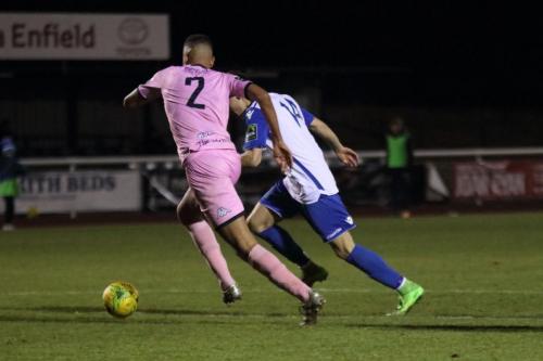 Enfields Ben Ward-Cochrane (R) beats Quade Taylor before scoring the final goal, in stoppage time