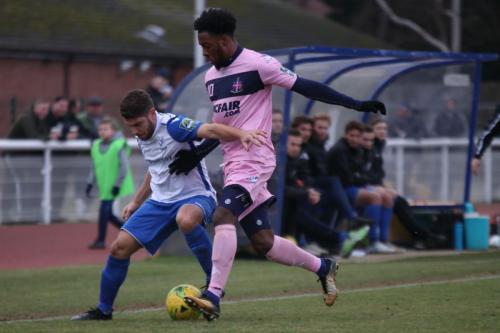 Enfields John Kyriacou (L) and Dulwichs Nathan Ferguson