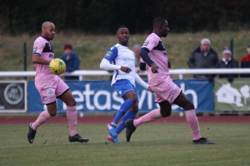 Enfields Ryan Blake and Dulwichs Sanchez Ming (L) and Anthony Acheampong