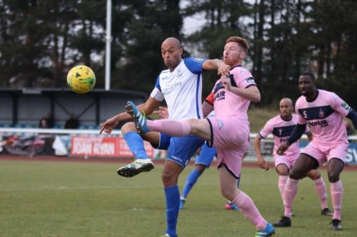 Enfields Simon Thomas (L) and Dulwichs Marc Weatherstone