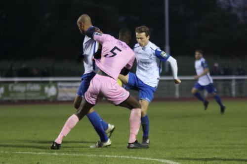 Enfields Simon Thomas (L) and Mickey Parcell and Dulwichs Anthony Acheampong