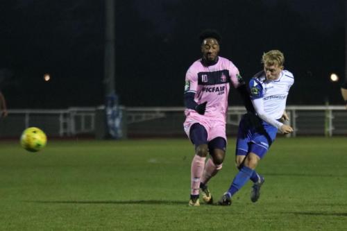 Ryan Blackman (R) puts Enfield 2-1 up with a long-range shot