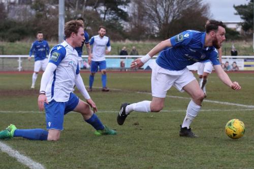 Enfields Aaron Greene (white) and Lowestofts Rory McAuley59