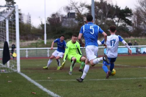 Enfields Jack Hockney (17) squares the ball for Liam Hope to score the third goal