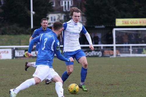 Enfields Mickey Parcell (R) runs at Adam Smith