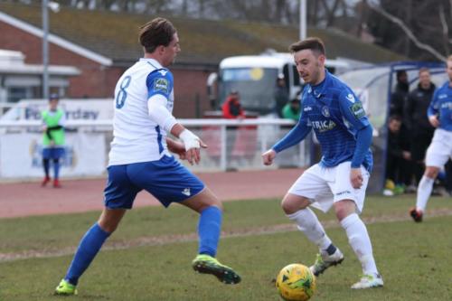 Enfields Sam Youngs (L) and Lowestofts Adam Smith