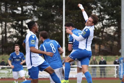 Enfields Sam Youngs  (R) challenges Travis Cole