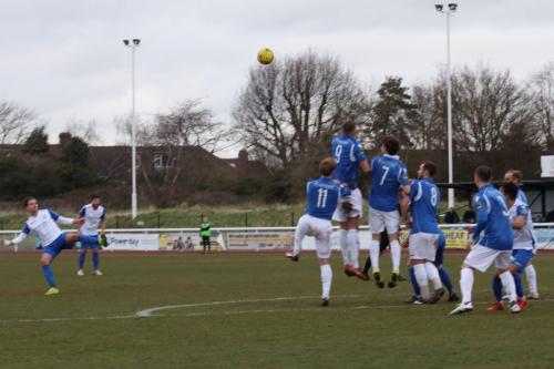 Enfields Sam Youngs sends a free kick over the wall and over the crossbar