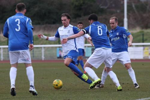 Enfields Sam and Lowestofts Adam Smith (3), Travis Cole (6) and Andrew Fisk