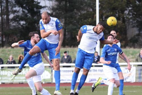 Enfields Taofiq Olomowewe (white, R) heads wide but either he or Simon Thomas had been given offside