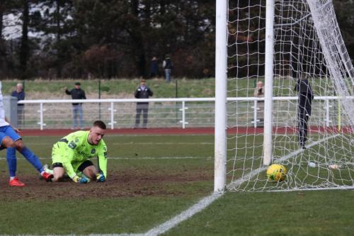 Lowestoft keeper Ben Dudzinski can only watch as his half-save from Mat Mitchel-King trickles over the line